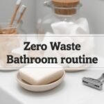 Minimalist bathroom counter with bamboo toothbrush, bar soap, and reusable razor.